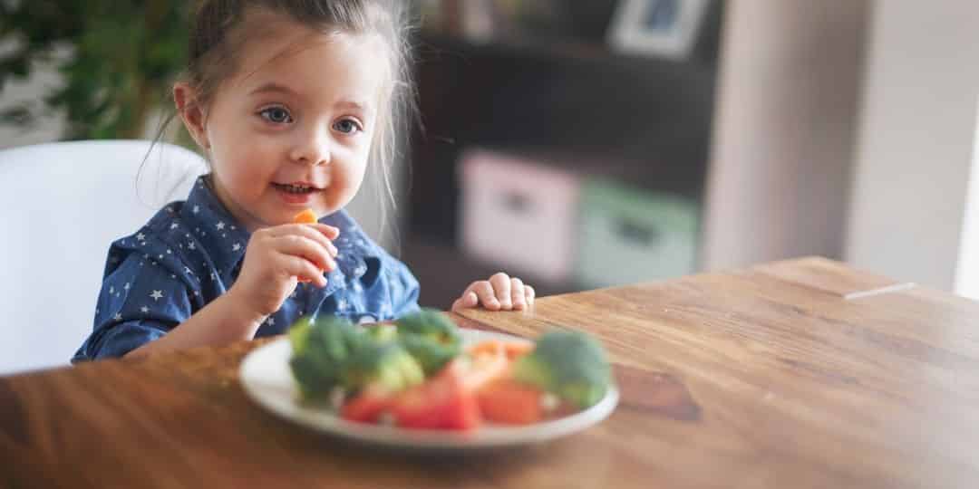 kid eating plant-based meal