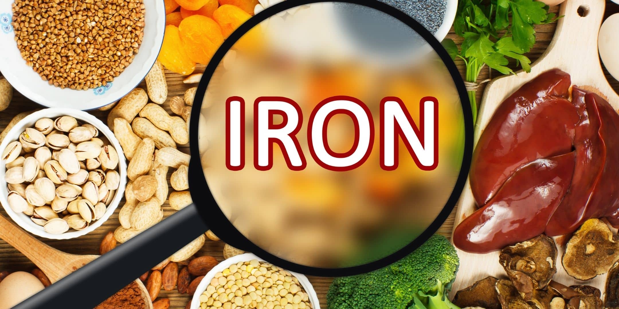 iron foods with a magnifying glass on the word iron