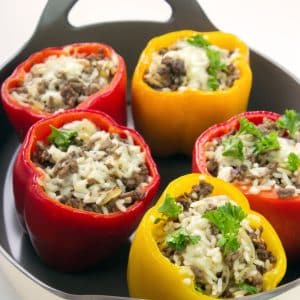 stuffed bell pepper for baby, with rice cheese and ground meat in a cast iron pan